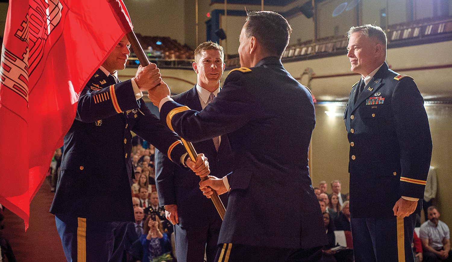 Brig. Gen. Mark Toy passes the District’s colors to Lt. Col. Josh Miller as he assumes command of the Huntington District. Outgoing Commander Col. Philip Secrist and Deputy District Engineer Joseph Savage look on.