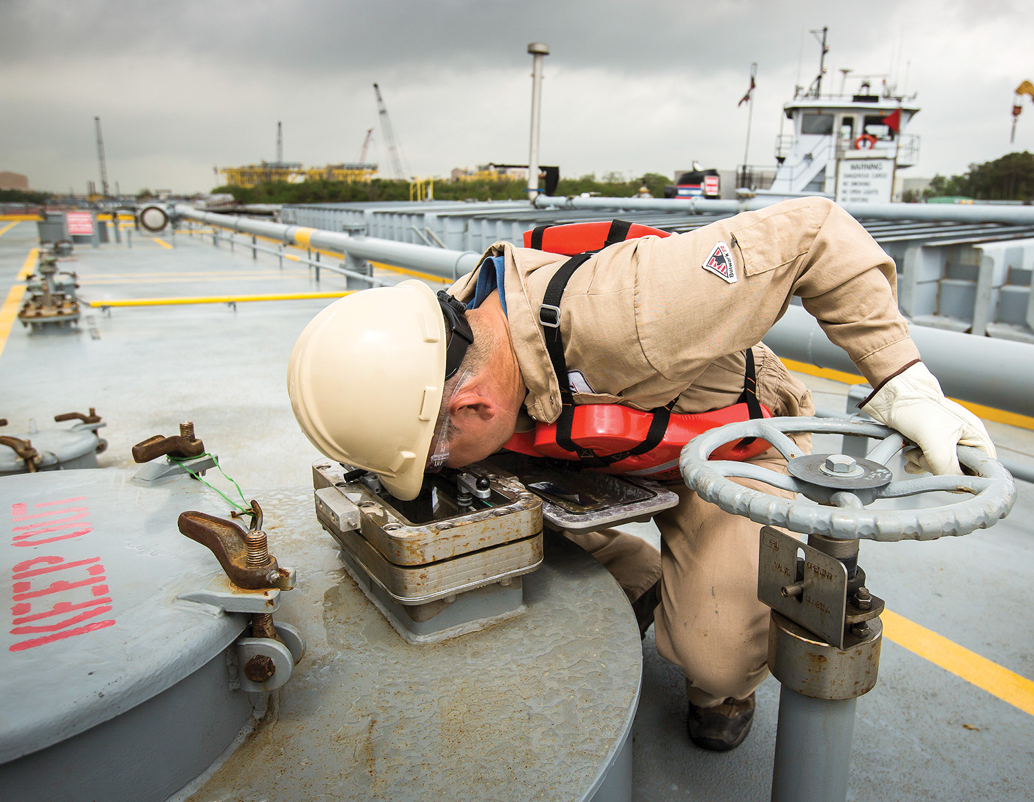 PSC Tankerman Robert Hopper monitors the flow of product into a cargo tank. (Photo courtesy of Petroleum Service Corporation)