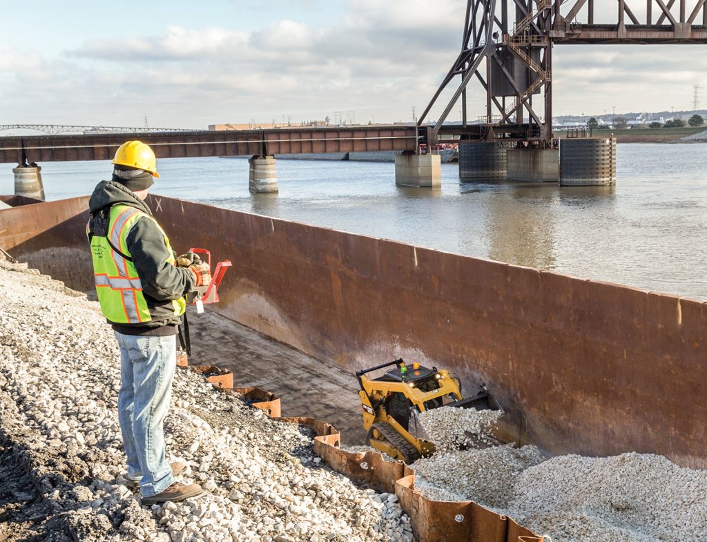 The RemoteTASK remote control system allows terminal operators to work in tight environments, such as steel mills, ship holds and barges. (photo courtesy of Caterpillar)