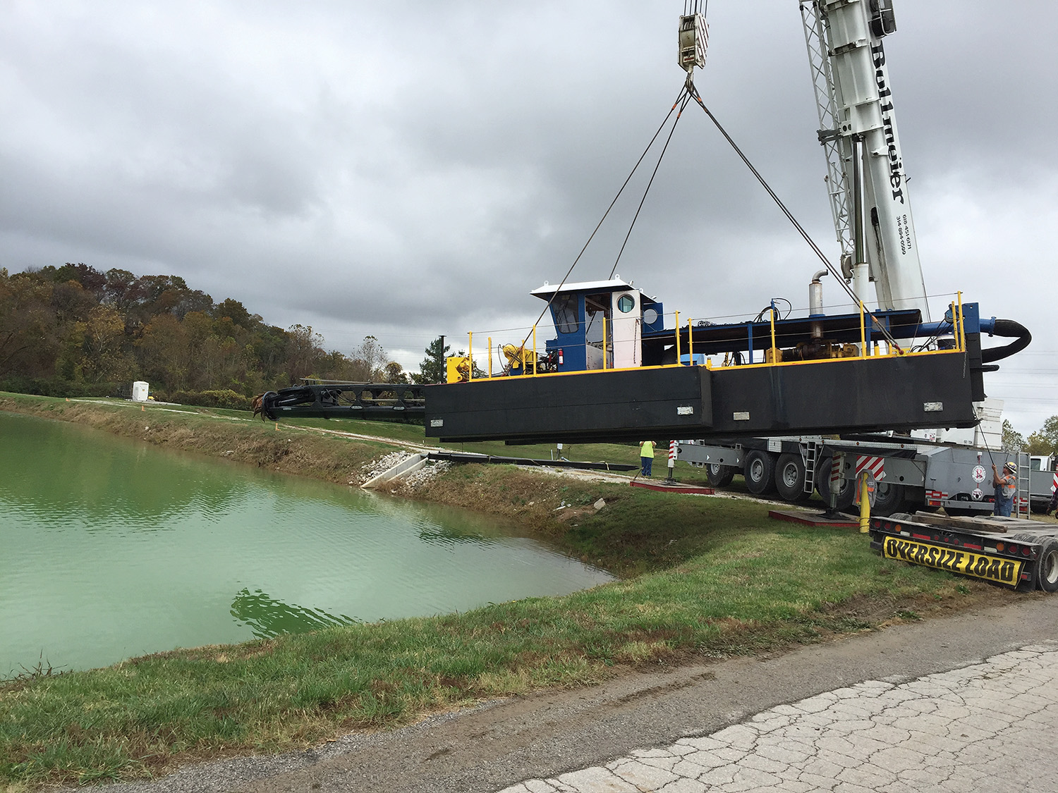 A woman-owned dredging business, Energy Resources Inc. operates three small dredges and collects sediment into geotubes for removal.