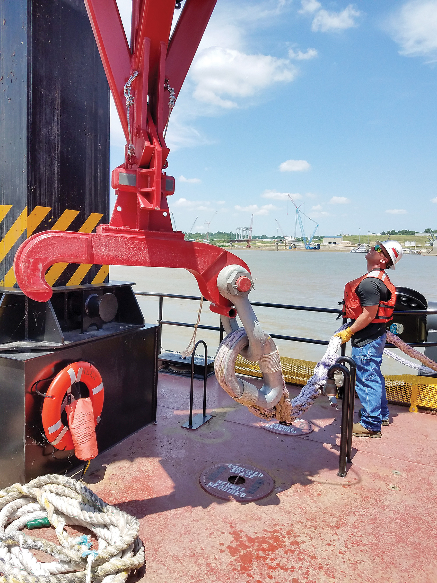 Corps employees continue training with and testing the new wicket lifter Keen at Olmsted Locks and Dam. The equipment will allow the Corps to lift the wickets at the dam and hold pool for safer navigation.