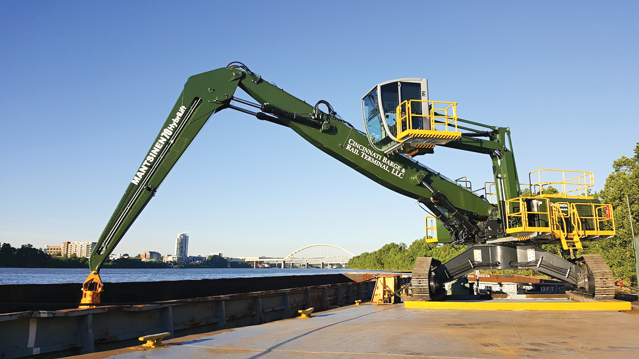 The Mantsinen 70R material handler, newly installed at Cincinnati Barge & Rail Terminal, has a maximum reach of 79 feet and is equipped with Tier 4 emissions-control technology.