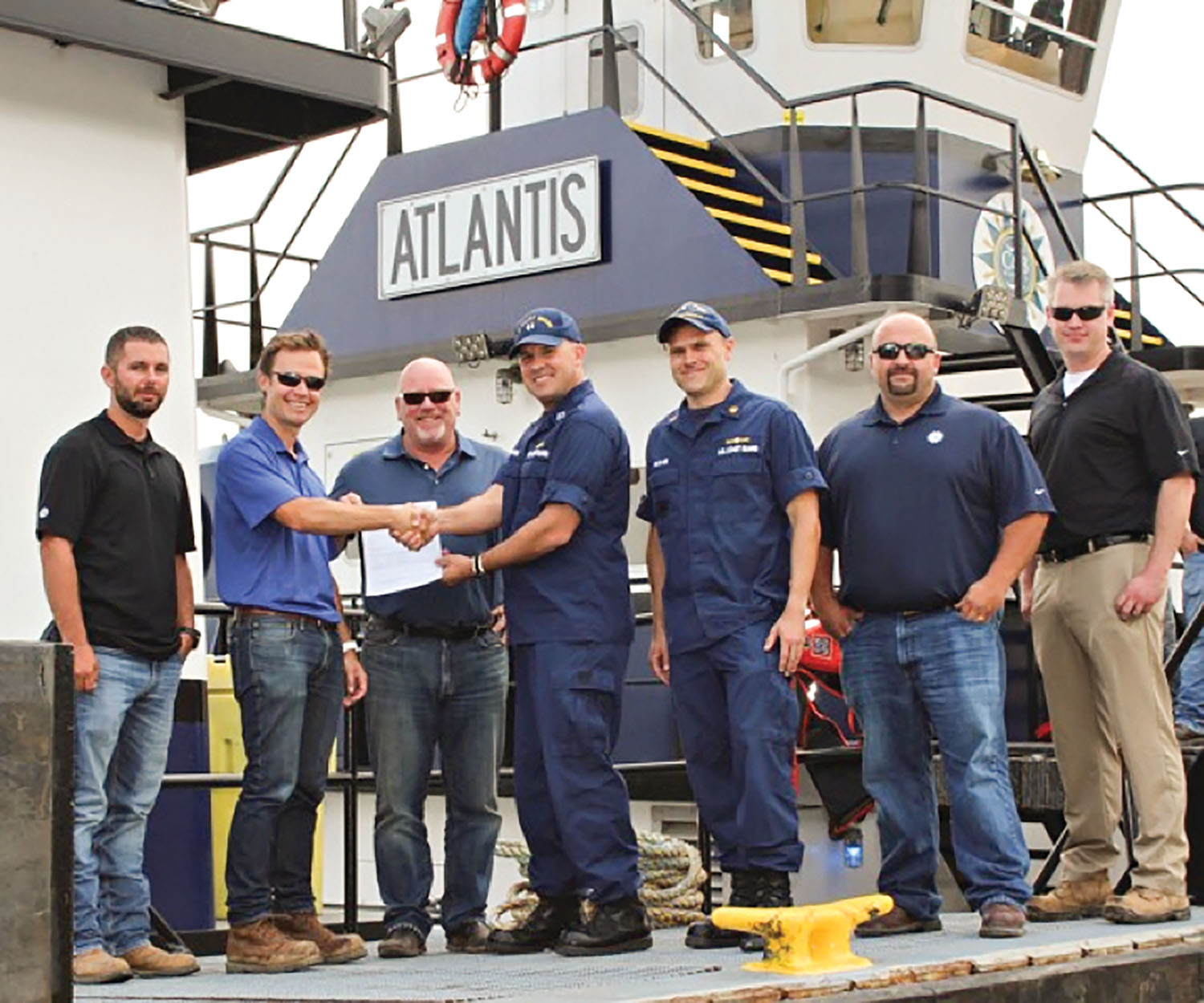 From left, Port Engineer David Westrich; C&B CFO Scott Bray; C&B co-owner Rob Carlisle; Lt. Jim Brendel, supervisor of MSD Cincinnati; CWO Michael McClain, marine inspector, MSD Cincinnati; C&B General Manager Ed Lapikas; and C&B Safety Manager Greg Schabell.