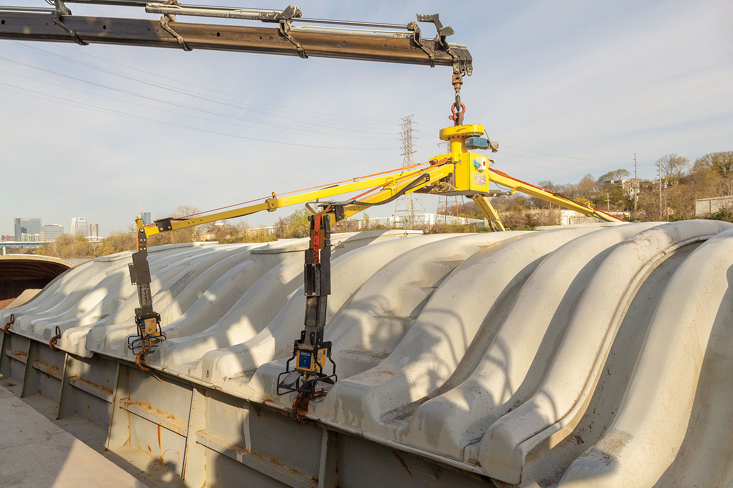 X-Factor system allows a terminal to remove covers without having a worker on the barge.