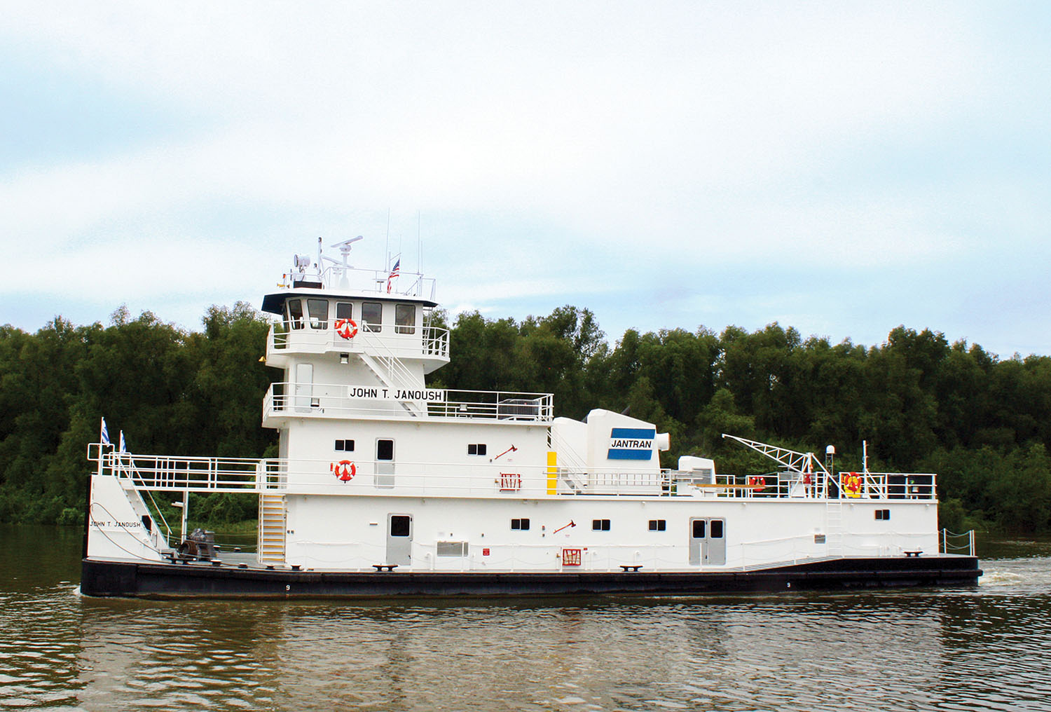 The mv. John T. Janoush, named for JANTRAN’s former manager of operations who died of lung cancer last year, is a closed-wheel boat that measures 114 by 35  by 11 feet, with a 9-foot draft. (Photo courtesy of JANTRAN Inc.)