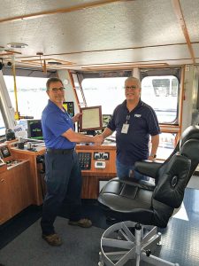 Capt. Ricky Torres and Capt. Tony Economy on the mv. Capt. Ricky Torres.