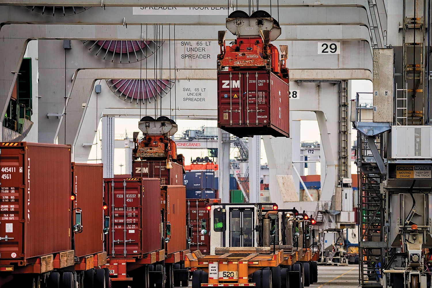 Ship-to-shore cranes load export boxes onto vessels at the Port of Savannah’s Garden City Terminal in this February 26, 2018, file photo. The Georgia Ports Authority handled nearly 414,000 twenty-foot-equivalent container units in October. (photo courtesy of Georgia Ports Authority/Stephen B. Morton)