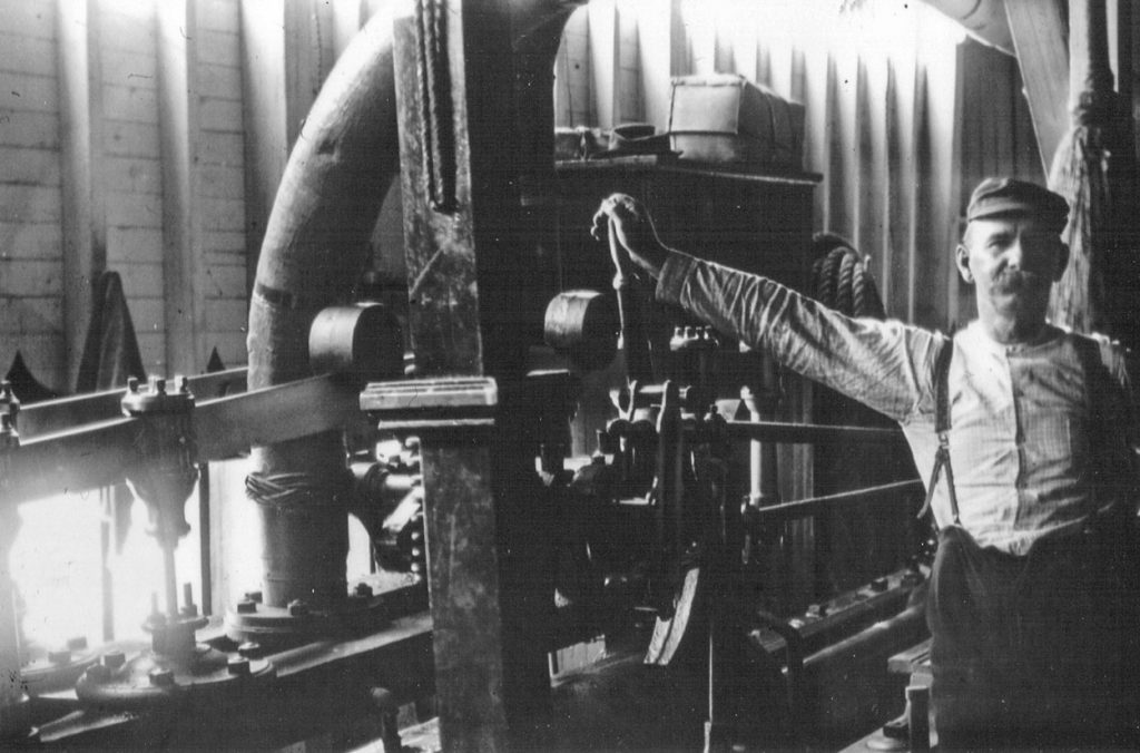 The engineer at work aboard the Tacoma. (Keith Norrington collection)