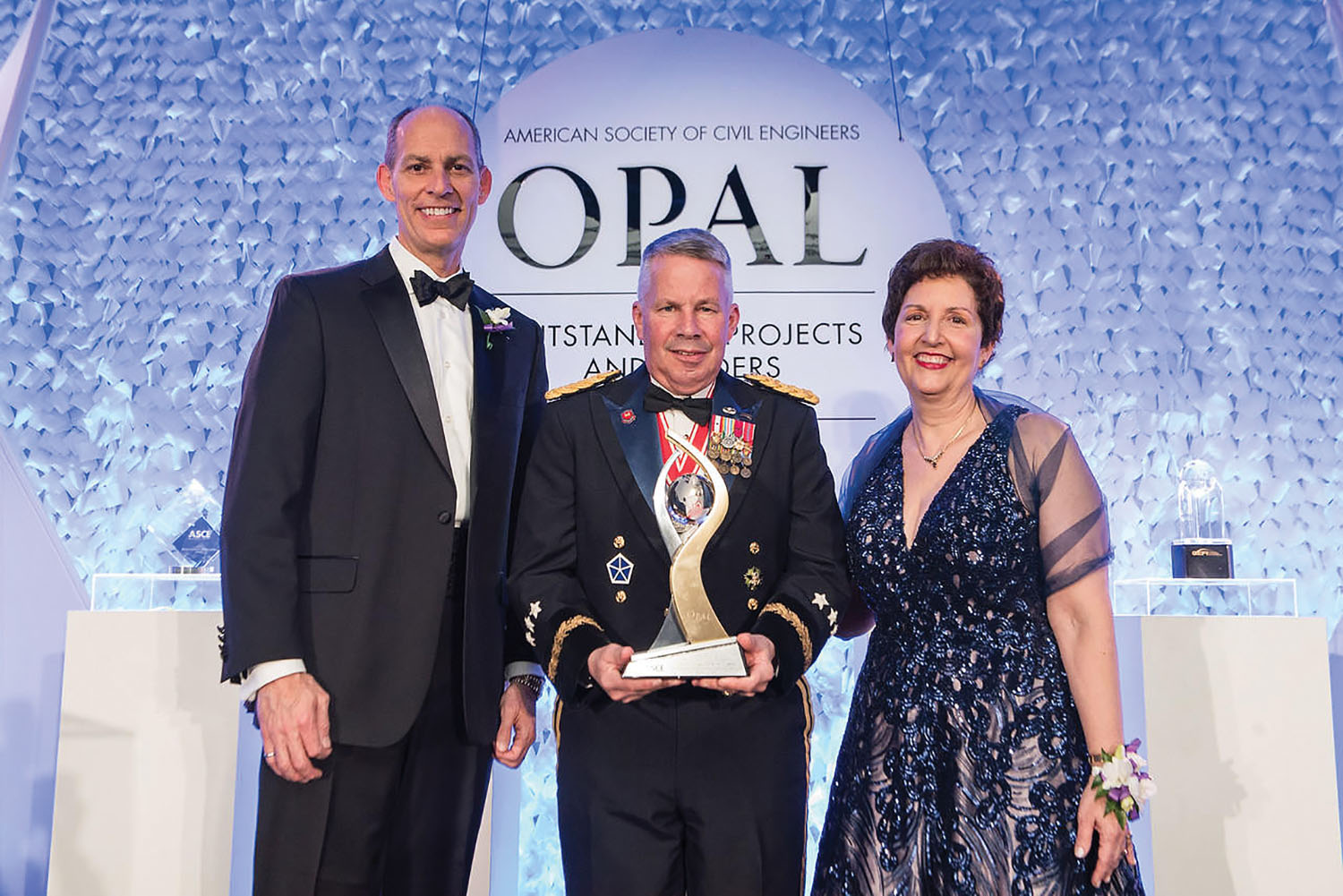 The OPAL award was presented on March 14, during ASCE’s annual OPAL Gala in Arlington, Va. Shown: Lt. Gen. Semonite poses with Thomas W. Smith III, ASCE executive director, and Robin A. Kemper, ASCE 2019 president. (Jason Dixon Photography)