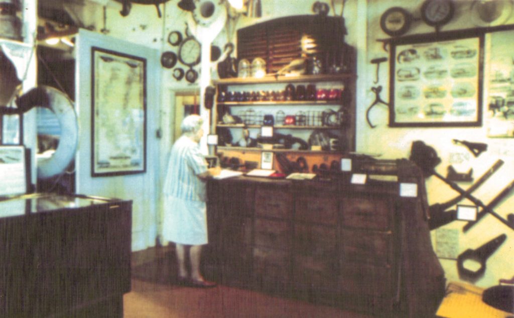 Fifty Years Ago: Curator Ruth Ferris stands at the counter of the Eagle Boat Store in the Midship Museum aboard the steamer Becky Thatcher in 1969. (Keith Norrington collection)