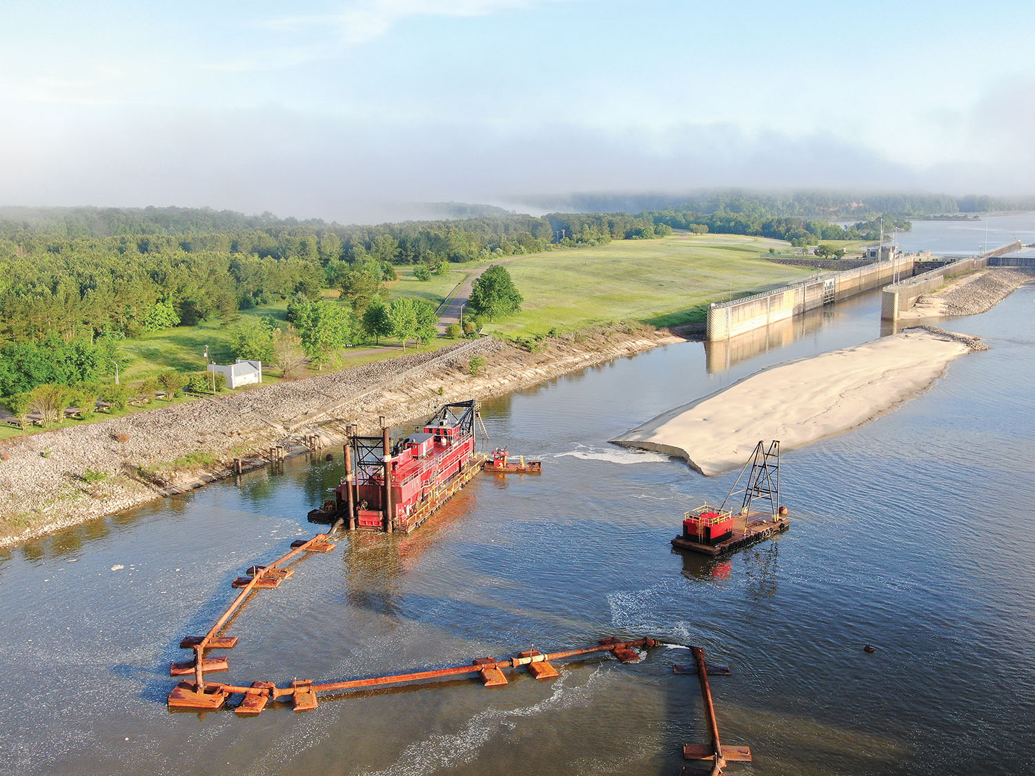 The dredge E. Stroud works to clear the waterway below Aberdeen Lock and Dam. (Photo courtesy of Mobile Engineer District)