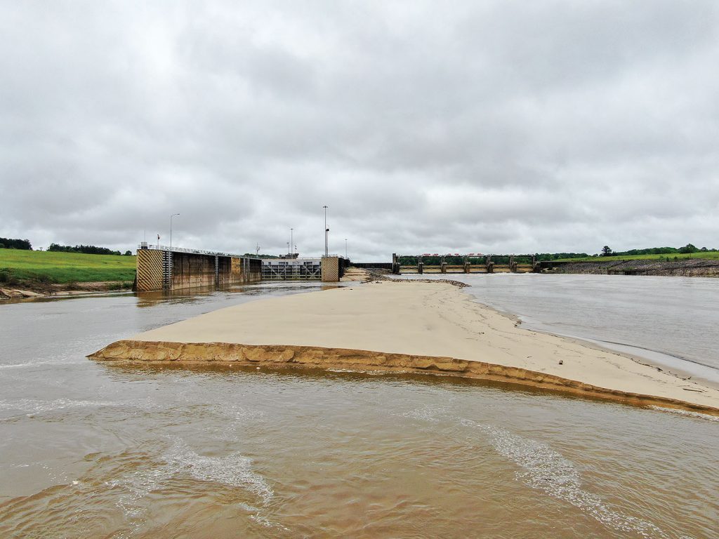 Some 400,000 cubic yards of sediment created a sandbar that extended several feet out of the water. (Photo courtesy of Mobile Engineer District)