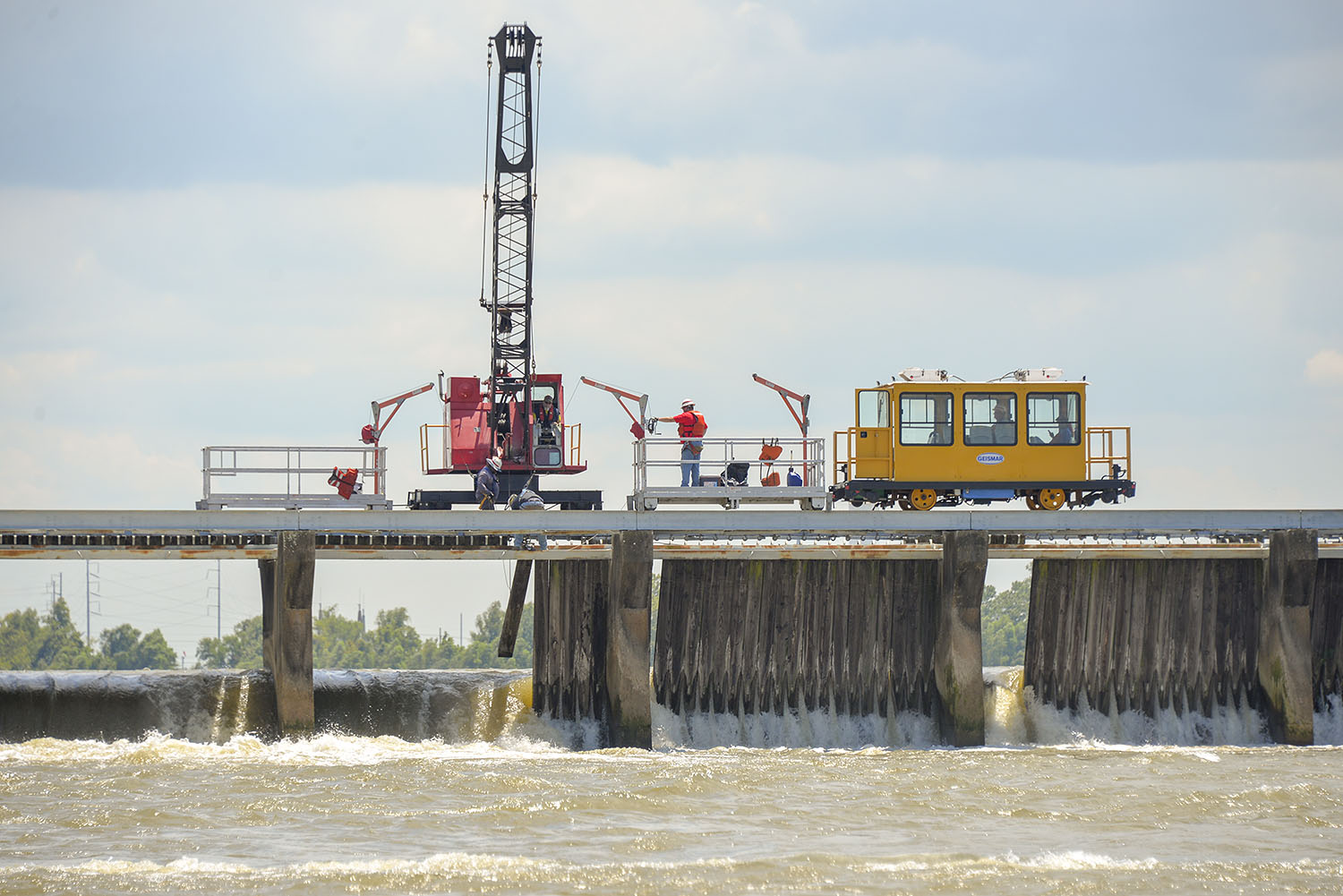 A Corps of Engineers crew works to close bays in the Bonnet Carré Spillway July 25. (Photo courtesy of New Orleans Engineer District)