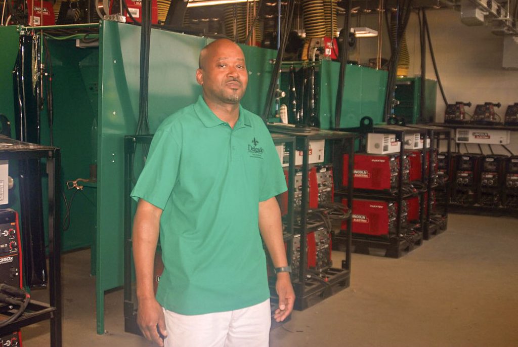 Alcindo Frye in Delgado’s welding shop. (Photo by Capt. Richard Eberhardt)