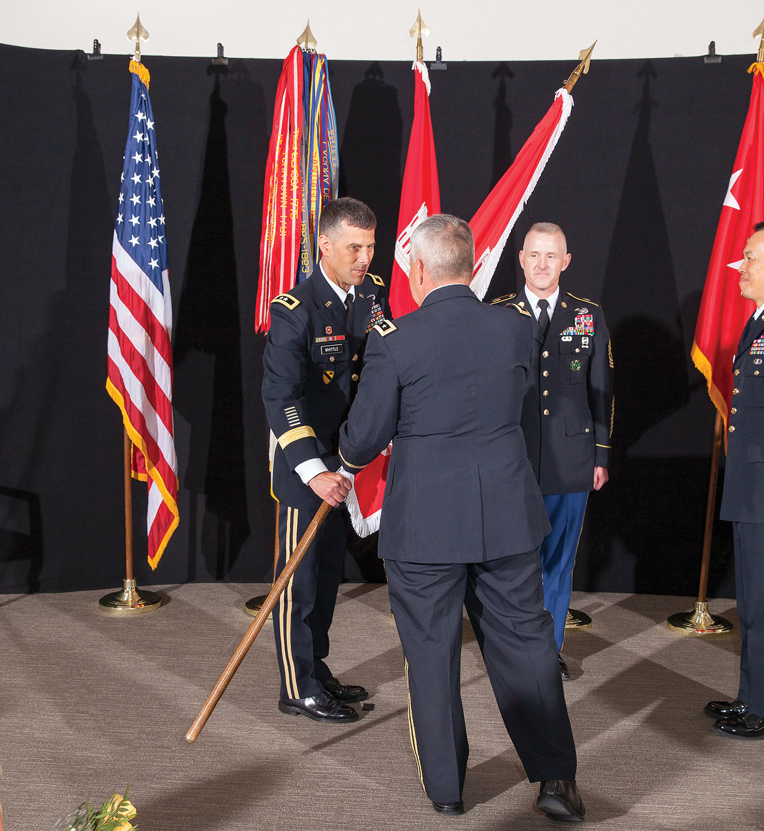 Maj. Gen. Robert Whittle Jr. accepts the Great Lakes and Ohio River Engineer Division flag from Chief of Engineers Lt. Gen. Todd Semonite during the division’s change-of-command ceremony July 12 in Cincinnati, Ohio. (Corps of Engineers photo by Jack Sweenney)