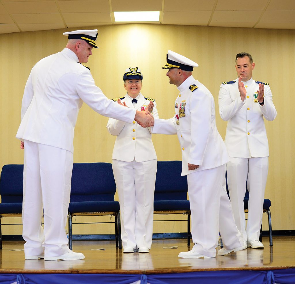 Cmdr. Darwin Jenson relieves Cmdr. Daniel Cost of command at a change-of-command ceremony for Marine Safety Unit Lake Charles on July 10. (U.S. Coast Guard photo by Petty Officer 2nd Class Johanna Strickland)