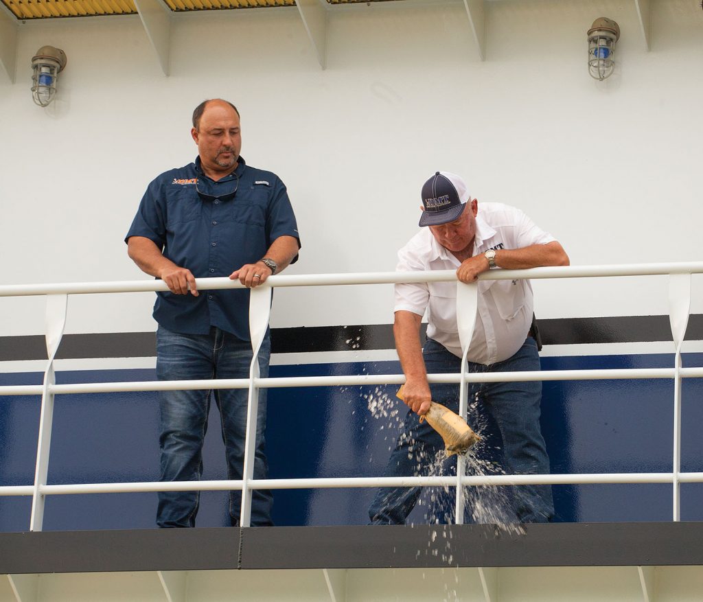 Everard Dupre christens namesake vessel while Rory Dupre looks on. (Photo by Frank McCormack)