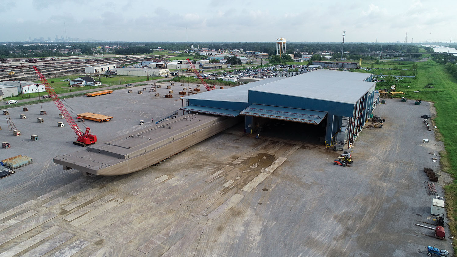 Freshly blasted barge goes into the paint facility.