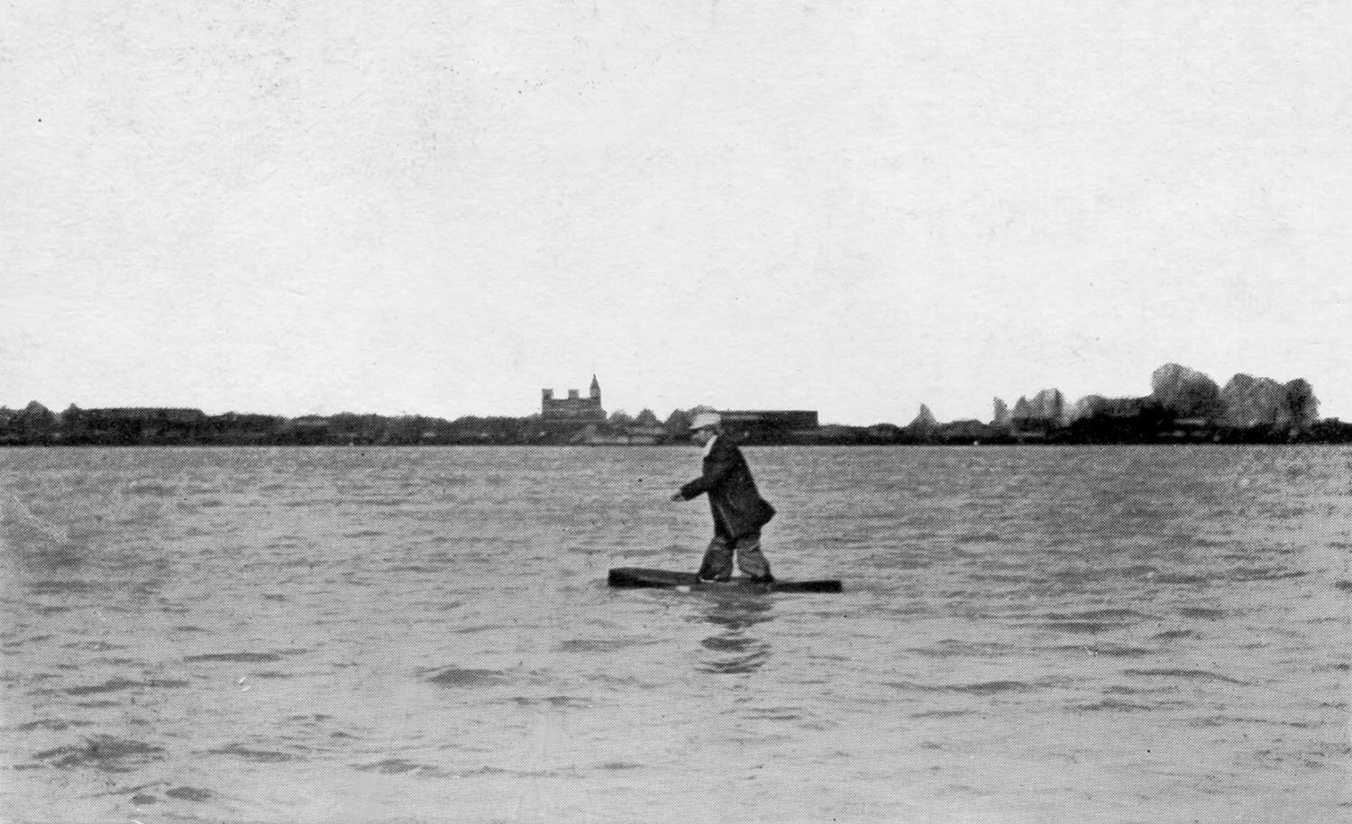 Charles Oldrieve walking on the Mississippi River at Arkansas City, Ark.