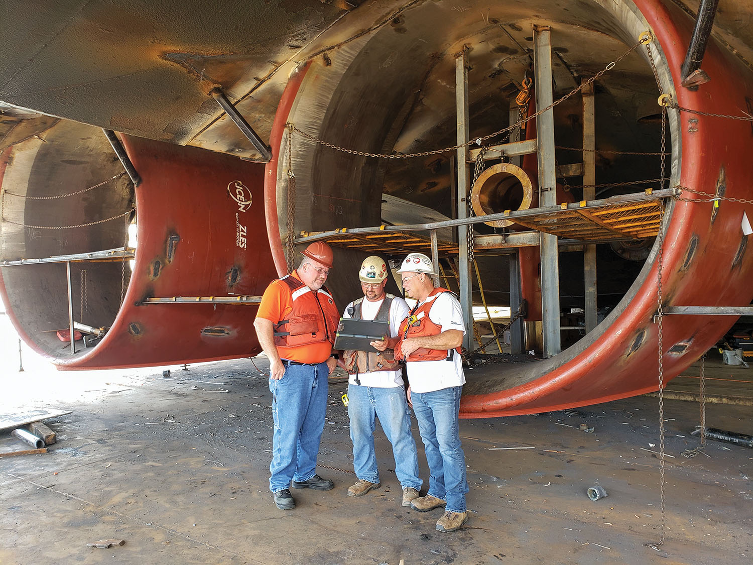 ACBL project managers Ron Schneider and Ron Culp flank James Marine superintendent Raymond Willingham. (Photo courtesy of ACBL)