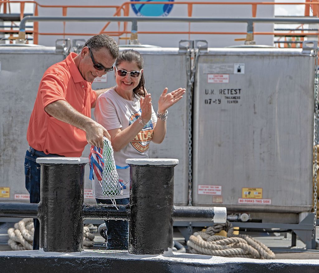 Sam and Nada Simon do the honors. (Photo courtesy of Atlas Marine Services)