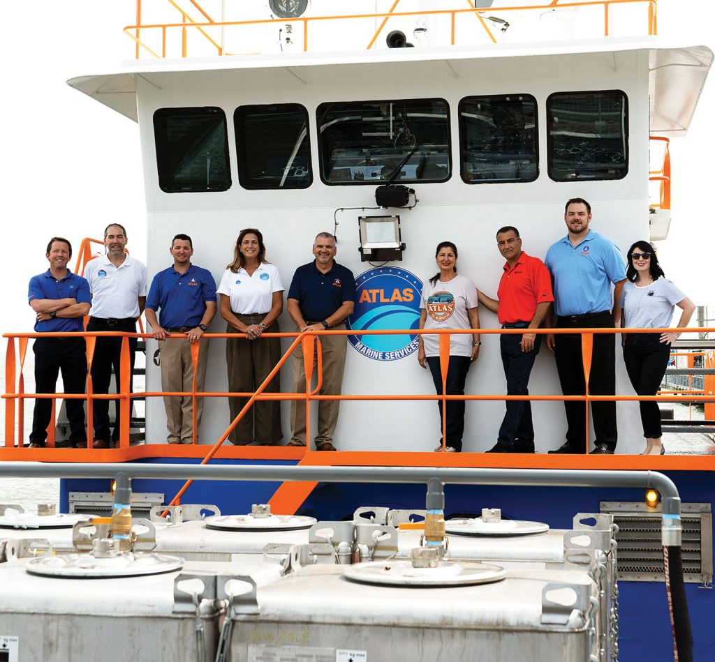 From left: Michael Fahy, Jonathan Brown, Chris Milligan, Donna Garner, Bob Kenyon, Nada and Sam Simon, Clint Werth and Donna Penouilh. (Photo courtesy of Atlas Marine Services)