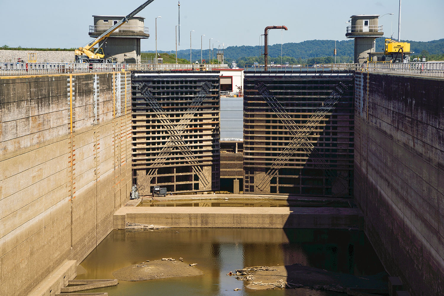 Repairs are underway to the upper miter gates on the main lock at the Robert C. Byrd Locks and Dam. The dam provides a 23-foot lift. (Photo by Jim Ross)