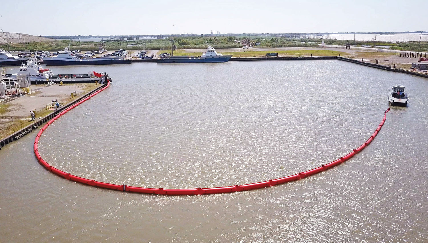 The Onboard Oil Containment System includes an automated reel ready for instant deployment.