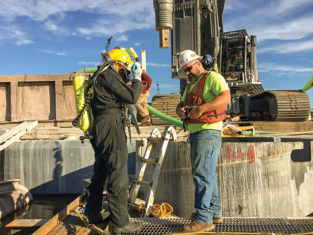 Diver Kyle Kokrda and supervisor Bryan Rich on the I-74 bridge project. (Photo courtesy of J.F. Brennan Inc.)