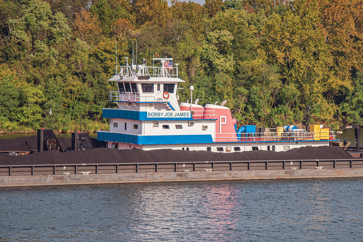 Pictured is the mv. Bobby Joe James coming through Demopolis, Ala. The vessel is named after a retired employee of Parker Towing Company; his wife, Vikki James, is a 20-year breast cancer survivor who volunteers her time working with the Relay for Life program. (Photo by Ford Nixon)