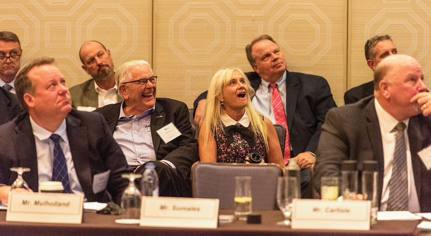 Deborah Calhoun is surprised by the announcement that she was the recipient of a National Rivers Hall of Fame Achievement Award. Next to her is Barry Palmer, founder of DINAMO and the first president of Waterways Council Inc. (Photo by Rev. David Rider)