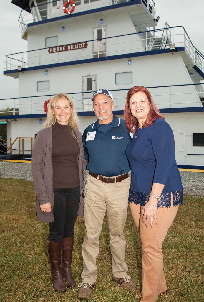 Enterprise Chairman Randa Duncan Williams (left) joins Capt. Pierre Billiot and his wife, Brenda, for the christening ceremony. (Photo by Frank McCormack)