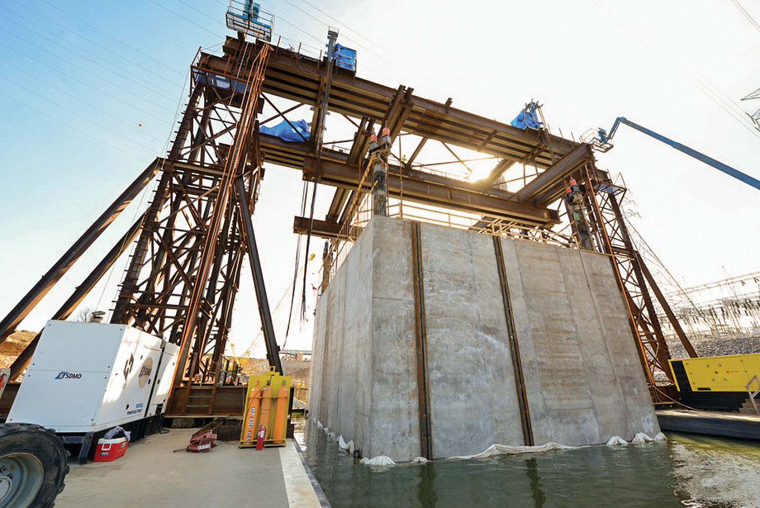 The Nashville Engineer District and its contractor partner Johnson Brothers put a 1.7-million-pound concrete shell into position February 2 on the riverbed on the downstream end of Kentucky Lock. The last of 10 shells, it will be part of a cofferdam and eventually a permanent part of the new lock wall for the Kentucky Lock Addition Project. (Corps of Engineers photos by Mark Rankin)