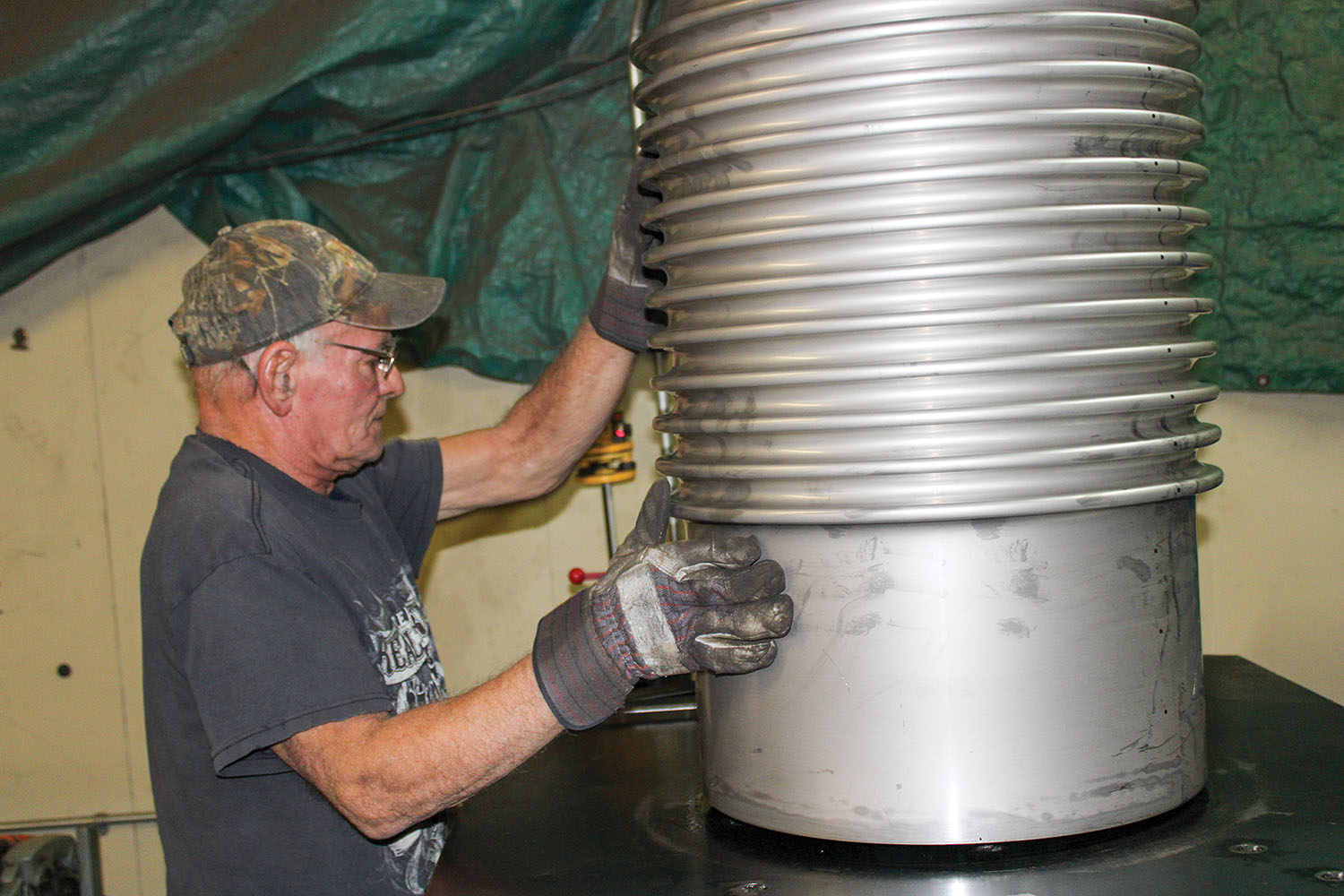 Jesse Ladd works on building an expansion joint inside JAGCO Industries on Old U.S. 45, south of Paducah. The small, family-owned company builds several products for the inland marine and other industries. (Photo by Shelley Byrne)