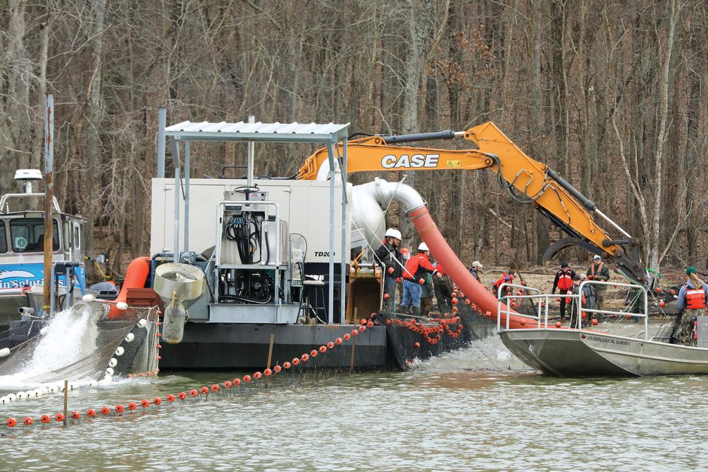 An Asian carp pulled out of Kentucky Lake. Vacuum boat used to pump carp out of the water. (Photo courtesy of Lee McClellan, Kentucky Department of Fish and Wildlife Resources)