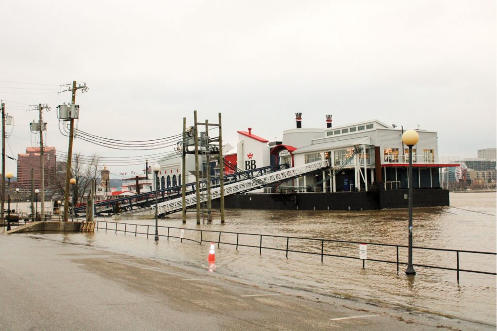 heavy rain swelled the Ohio River in Newport, Ky., on February 13, causing extended walkways to be used at BB Riverboats’ Newport landing. (Photo by Shelley Byrne)