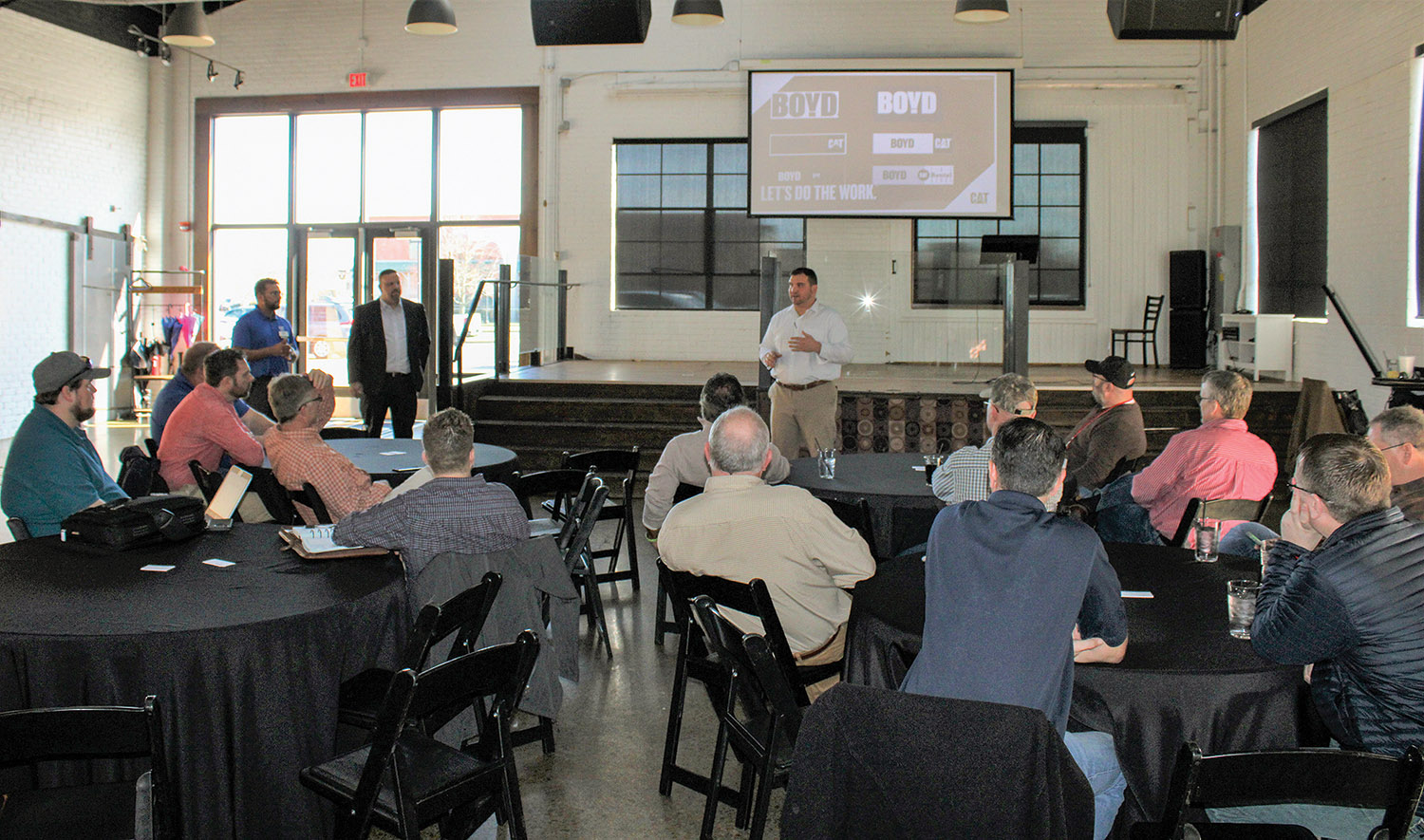 Lincoln Turnage of Boyd Cat talks to marine industry customers about Whayne Supply changing its name to Boyd Cat but retaining the same ownership. Boyd Cat hosted a digital workshop at the 1857 Hotel in Paducah to introduce customers to Caterpillar’s available digital services. (Photo by Shelley Byrne)