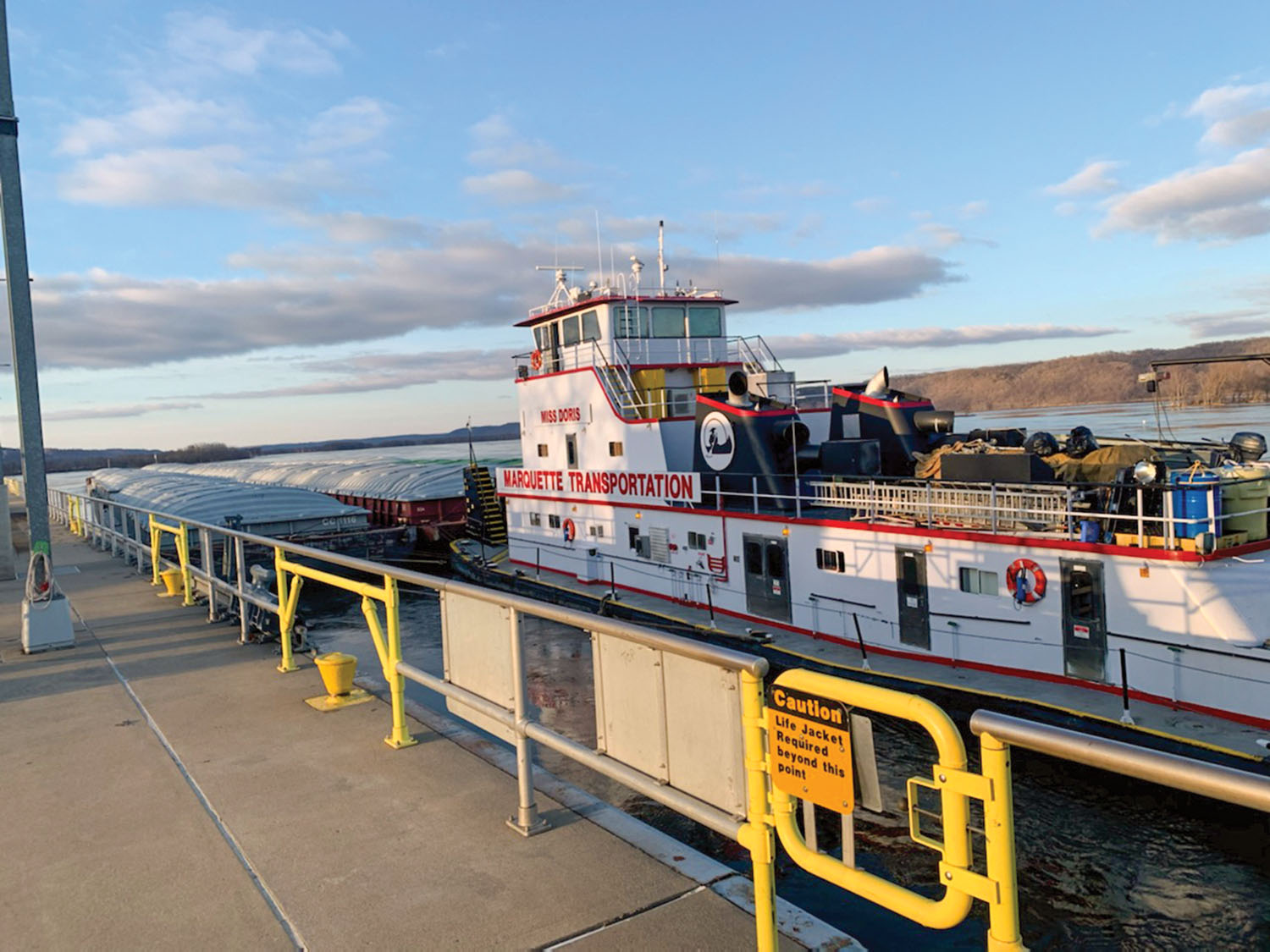 The mv. Miss Doris transits Upper Mississippi River Lock 10 March 15. (photo by Jason Hager, U.S. Army Corps of Engineers)