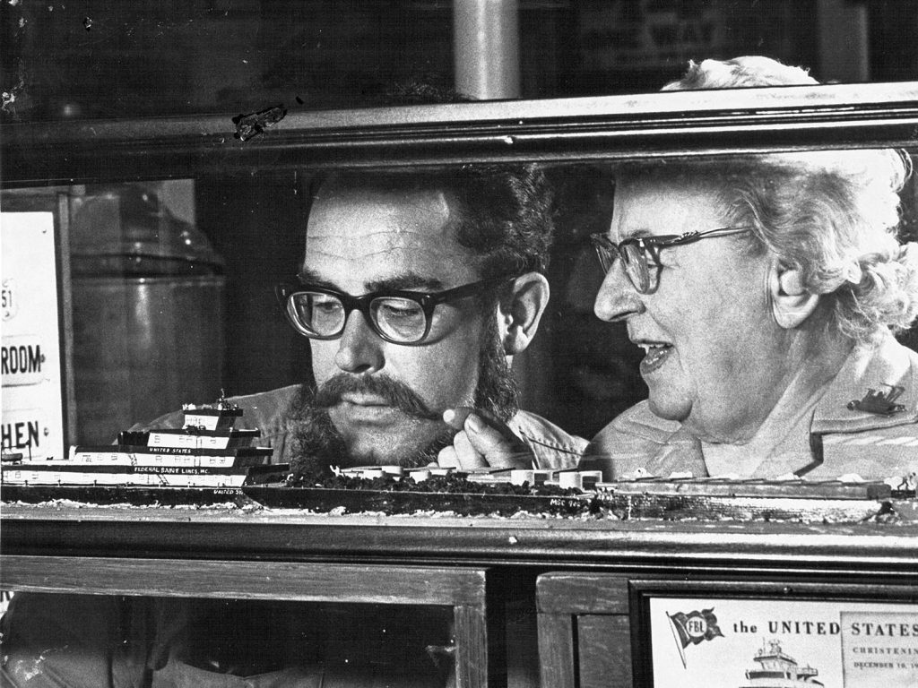 50 years ago: Midship Museum curator Ruth Ferris shows Capt. Don Summers the model she built in 1967 of the United States for the riverboat museum aboard the Str. Becky Thatcher at the St. Louis levee. (Keith Norrington collection)