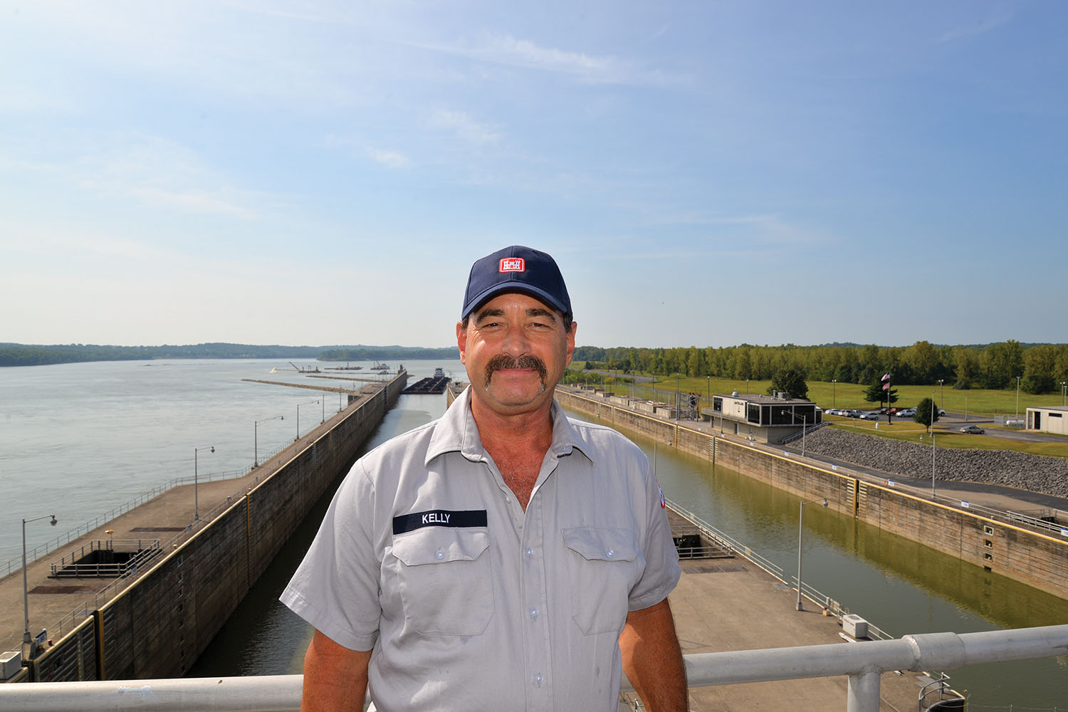 Lockmaster Jeff Kelly stands on top of Smithland Dam. His father, Wayne, was the first lockmaster there. His grandfather, uncle, first cousin and nephew also have made careers working for the Corps at locks and dams. (Photo courtesy of Louisville Engineer District)