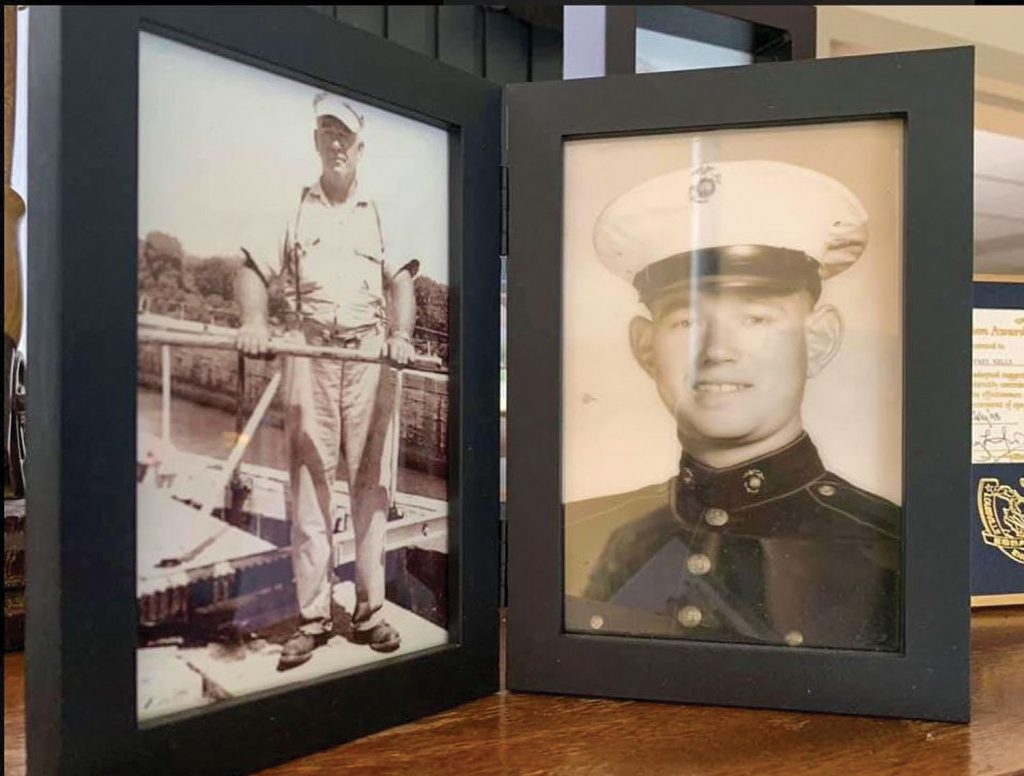 Portraits of Jeff Kelly’s grandfather, Paris Kelly (left) and father, Wayne Kelly (right) are displayed in Jeff Kelly’s office at Smithland Locks and Dam. Four generations of the Kelly family have worked for the Corps at locks and dams. (Photo courtesy of Louisville Engineer District)