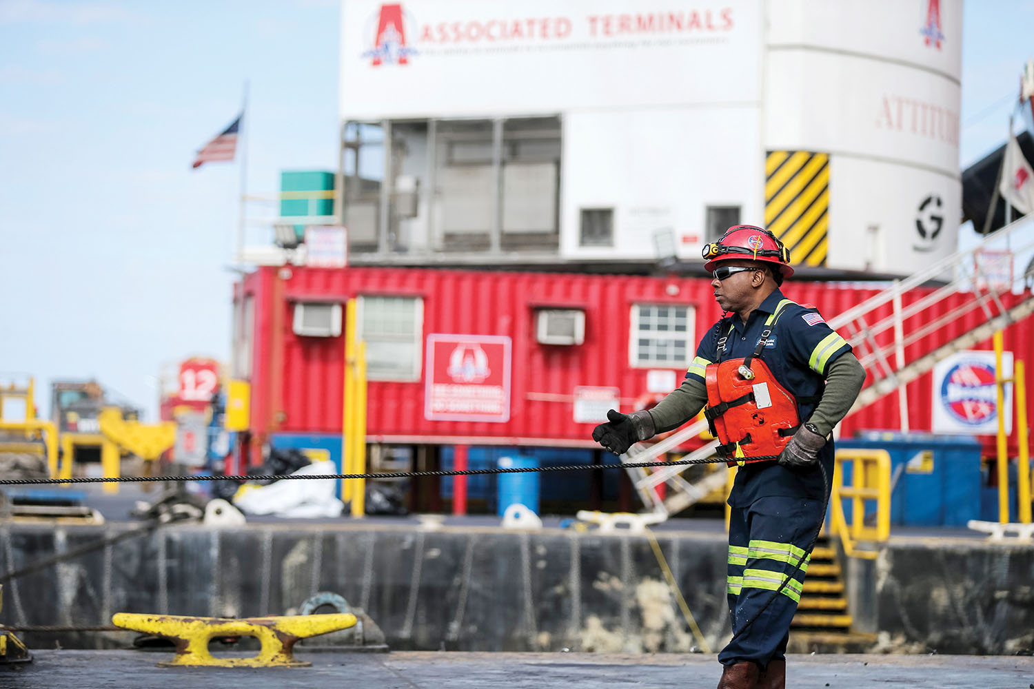 An Associated Terminals crew member assists in mooring a barge at one of the company’s locations along the Lower Mississippi River. (Photo courtesy of Associated Terminals)