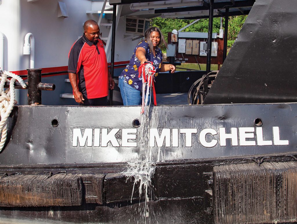 Natasha Mitchell, wife of Captain Mike Mitchell, officially christens the mv. Mike Mitchell into the Wood Towing fleet May 12. (Photo by Frank McCormack)