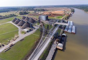 —photo courtesy of Watco Terminals At Watco’s bulk terminal on the Tennessee-Tombigbee Waterway in Amory, Miss., the company can store a variety of ores and coke in its seven domes, located adjacent to the waterway.