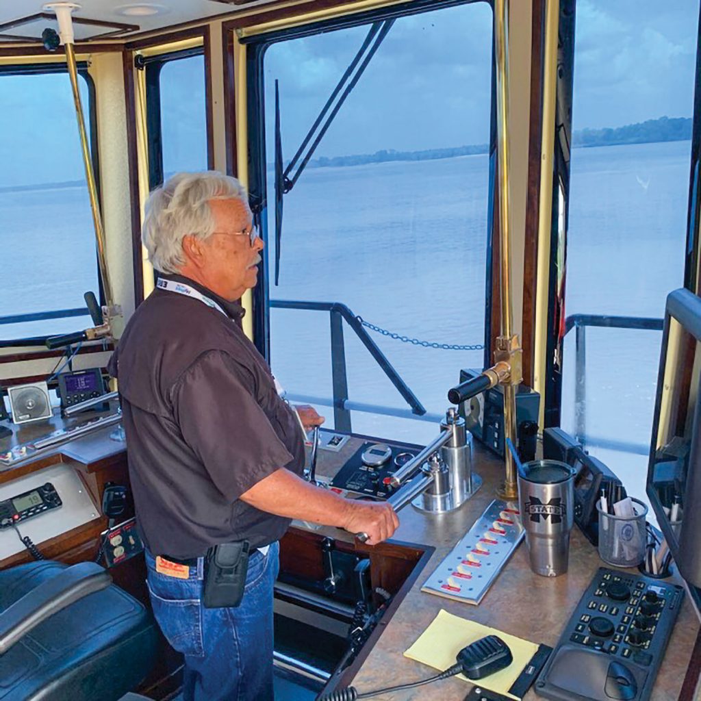 Danny Koestler at the helm of his namesake vessel. (Photo courtesy of Ergon Marine & Industrial Supply)