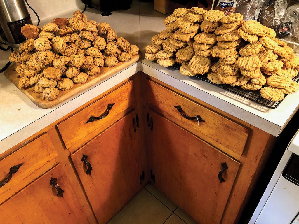 Rev. Tom Rhoades, a former towboat cook, estimates he cooked 4,000 to 5,000 cookies for the effort.