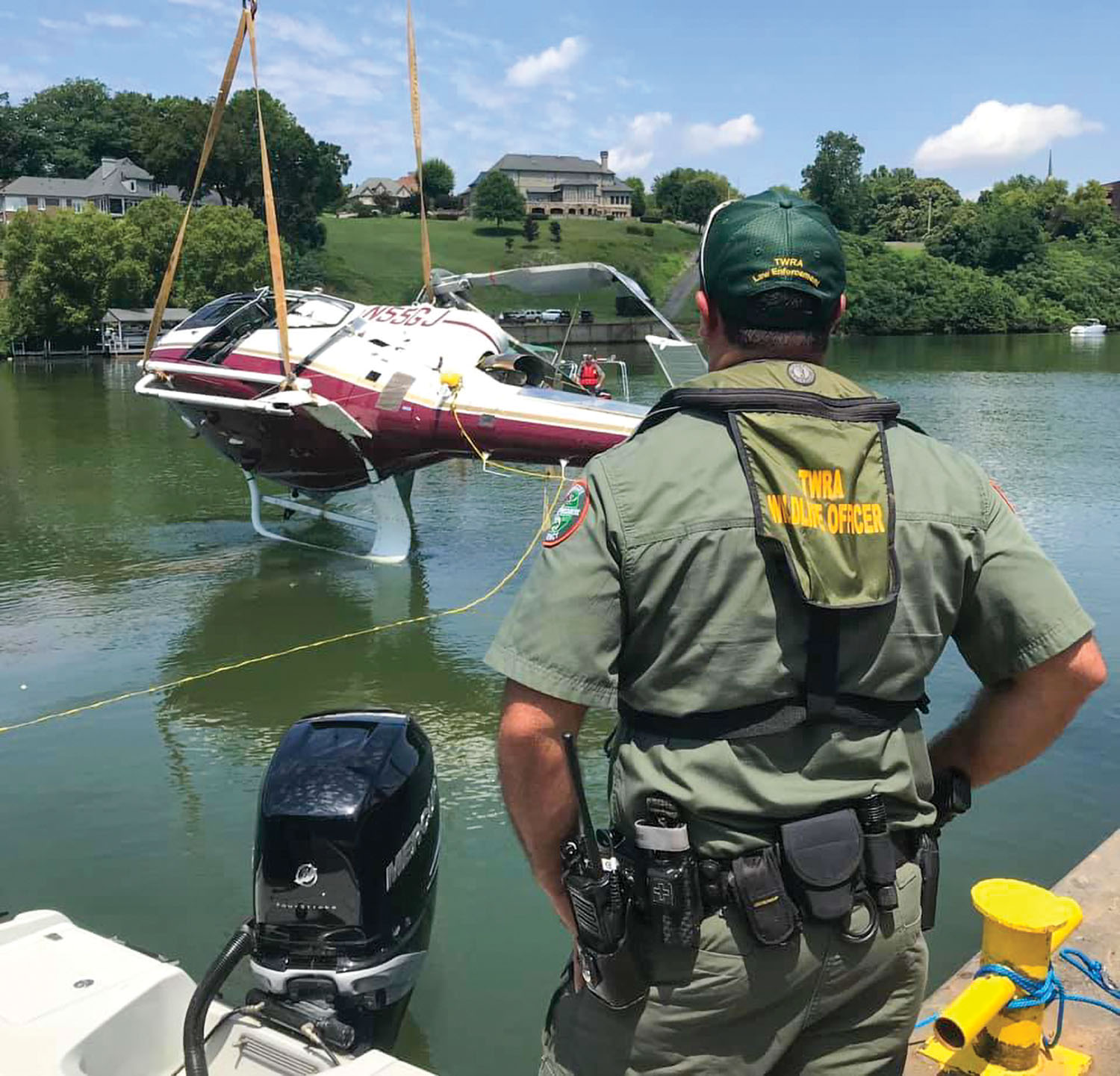 The Tennessee Wildlife Resources Agency assisted the Federal Aviation Administration in the recovery of the helicopter August 5 that crashed into Fort Loudon Lake, a reservoir of the Tennessee River. The August 3 crash killed Joe Clayton, co-founder of Clayton Automobiles and Clayton Homes. (Photo courtesy of Tennessee Wildlife Resources Agency)