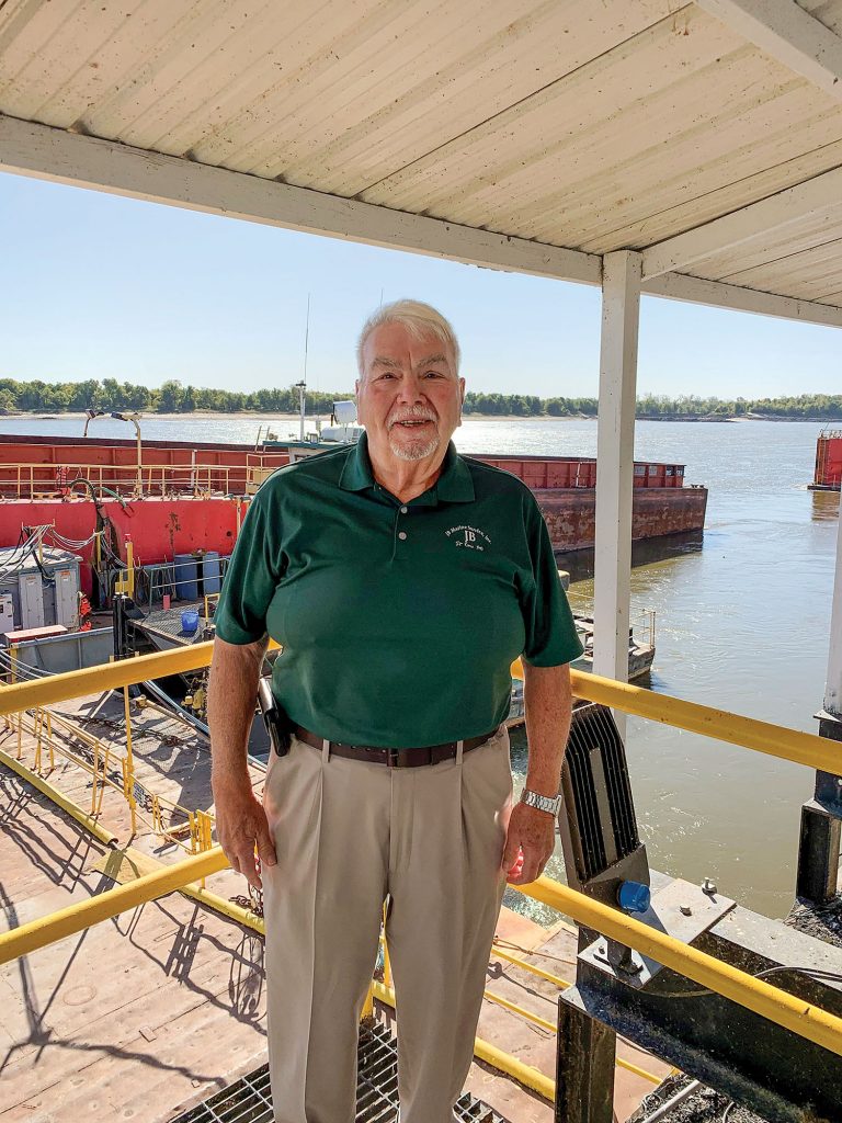 George Foster in front of one of the drydocks at JB Marine Service. (Photo courtesy of JB Marine Service)