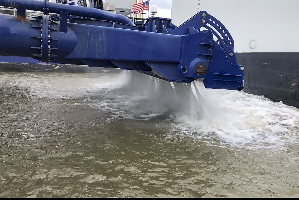These water jets push 5,000 gallons a minute at the toe of the suction draghead. The jets push sea turtles out of the way and loosen the material so that moves through the dredge like a fluid mud. (Photo courtesy of Brice Civil Contractors)
