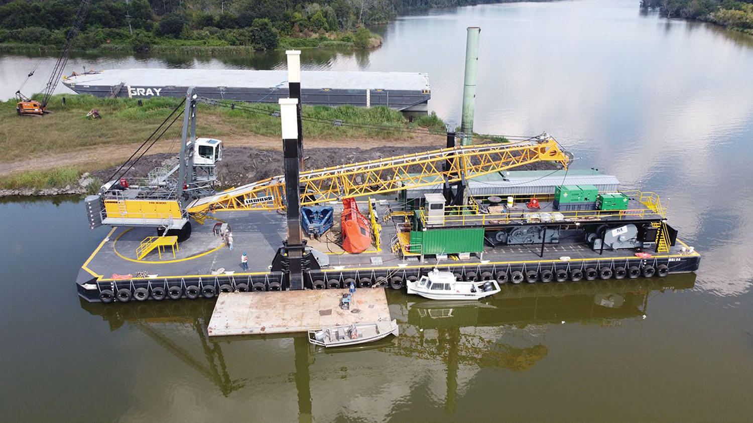 Walking spud dredge barge was built by LAD Services of Louisiana.